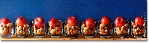 primitive christmas decorations made with glasses, nuts and apples