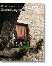 makeshift awning on a Tuscan window