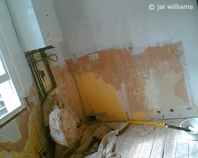The kitchen (after the hole under the window was plugged)
