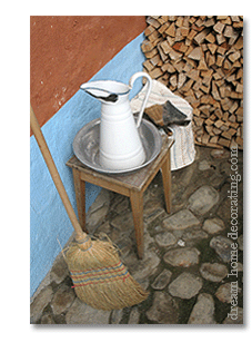 primitive rustic metal water jug & handmade broom