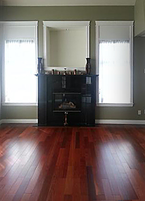 Open-plan living & dining room with cherrywood color flooring