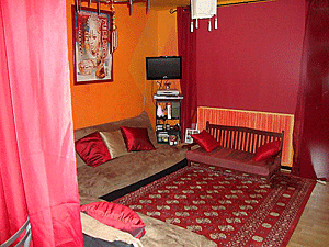 living room in pink, orange, and buff brown