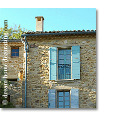 provencal house with blue shutters