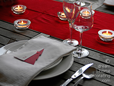 Christmas table setting in silver, white, grey and red