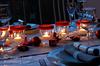 Christmas table setting with 'upcycled' jam jar lights