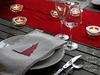 Christmas table setting in silver, white, grey and red