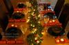 Our Christmas table with the garland and Christmas crackers