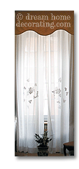 embroidered white cotton oversized window treatments in a Tuscan palazzo