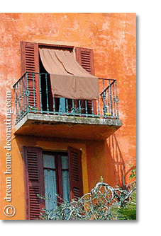 makeshift awning on an Italian balcony
